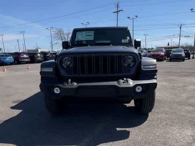 2026 Jeep Wrangler — rear three-quarter view