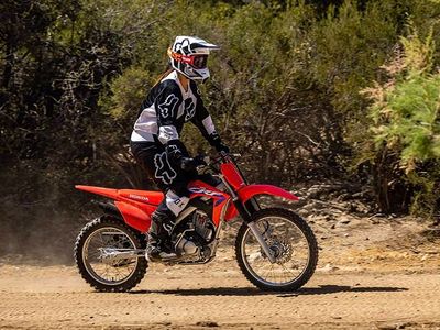 2025 Honda CRF125FB — rear three-quarter view