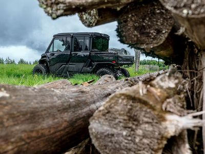 2026 Can-Am Defender XT CAB HD11 in Dark Wildland Camo — front three-quarter view