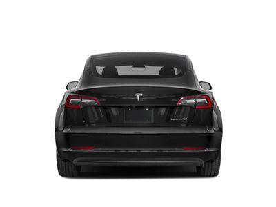 2022 Tesla Model 3 — rear three-quarter view