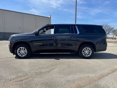 2025 Chevrolet Suburban — rear three-quarter view