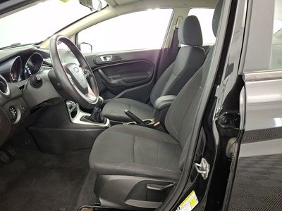 2015 Ford Fiesta — rear three-quarter view