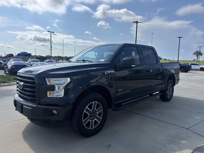 2015 Ford F-150 — rear three-quarter view