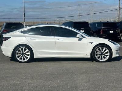 2019 Tesla Model 3 — side profile view