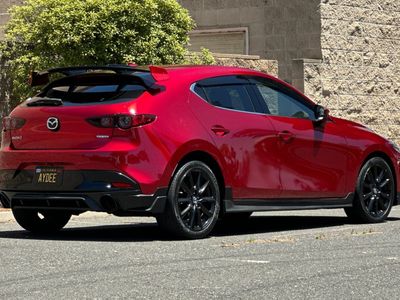 2021 Mazda Mazda3 — rear three-quarter view