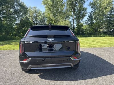 2026 Cadillac OPTIQ — rear three-quarter view