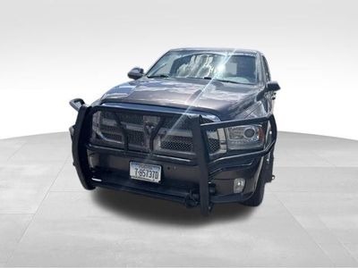 2014 RAM 1500 — rear three-quarter view