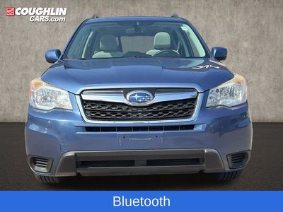 2015 Subaru Forester — rear three-quarter view