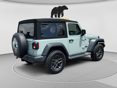 2024 Jeep Wrangler — rear three-quarter view