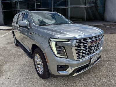2025 GMC Yukon XL — rear three-quarter view