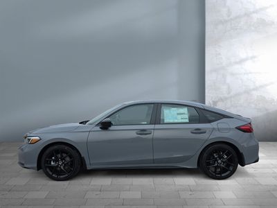 2026 Honda Civic Hatchback Hybrid — rear three-quarter view