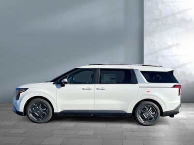 2026 Kia Carnival Hybrid — rear three-quarter view