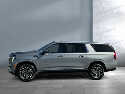 2026 GMC Yukon XL — rear three-quarter view