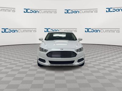 2014 Ford Fusion — rear three-quarter view