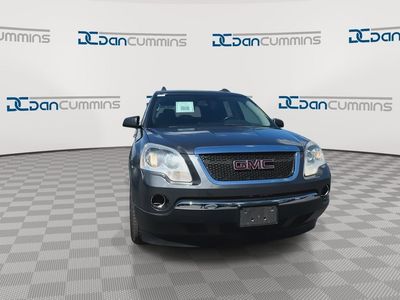 2011 GMC Acadia — rear three-quarter view