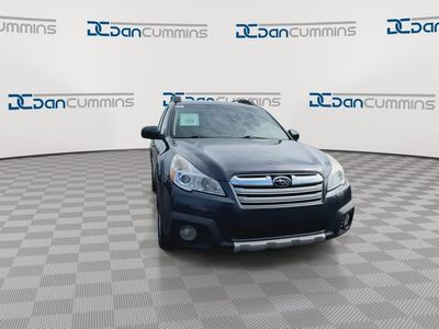 2013 Subaru Outback — rear three-quarter view