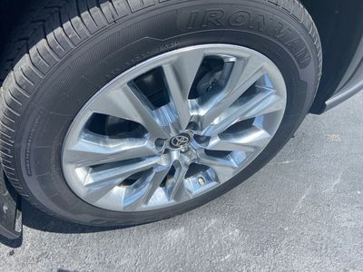 2024 Toyota Highlander Hybrid — rear three-quarter view