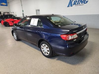 2013 Toyota Corolla — rear three-quarter view