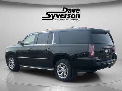 2015 GMC Yukon XL — rear three-quarter view