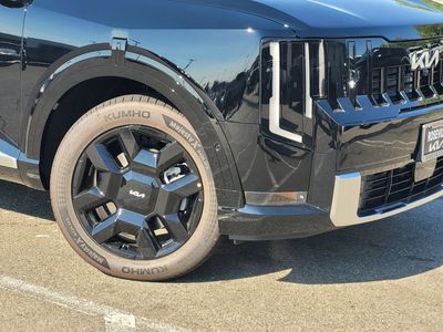 2027 Kia TELLURIDE HYBRID — rear three-quarter view