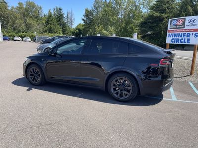 2023 Tesla Model X — rear three-quarter view
