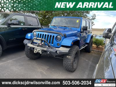 2014 Jeep Wrangler — rear three-quarter view