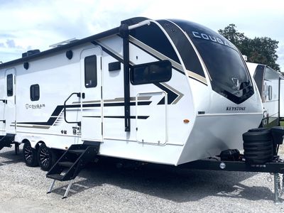 2026 Keystone RV Cougar Half-Ton 25FKD — front three-quarter view