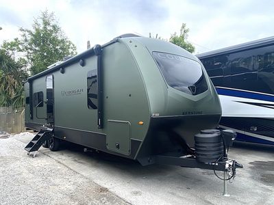 2026 Keystone RV Cougar Half-Ton Hero Edition 25MLE — front three-quarter view