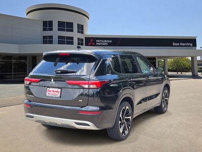 2024 Mitsubishi Outlander — rear three-quarter view