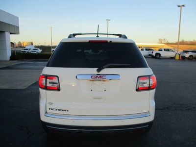 2015 GMC Acadia — rear three-quarter view