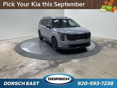2026 Kia Carnival — rear three-quarter view