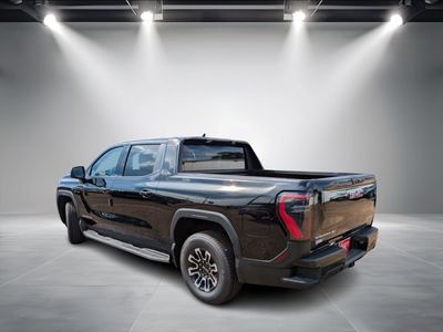2026 GMC Sierra EV — rear three-quarter view