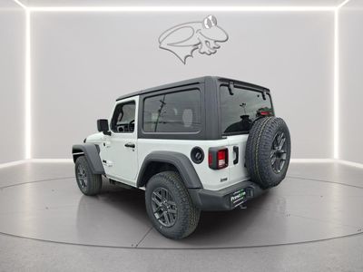 2026 Jeep Wrangler — rear three-quarter view