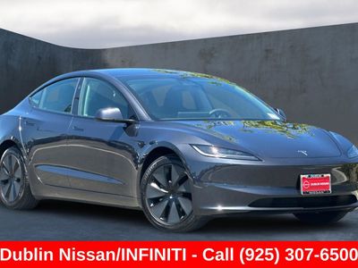 2025 Tesla Model 3 — side profile view