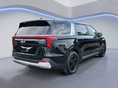 2025 Kia Carnival — rear three-quarter view
