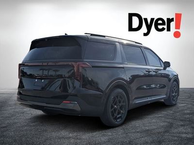 2026 Kia Carnival — rear three-quarter view