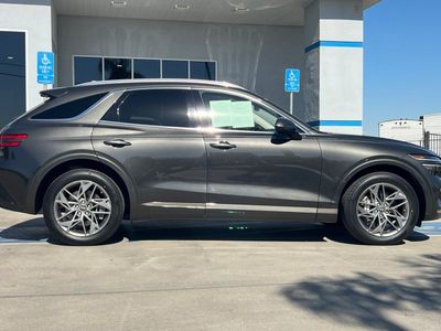 2025 Genesis GV70 — rear three-quarter view