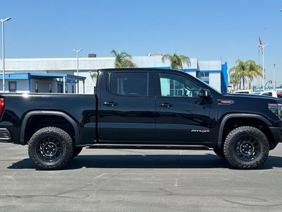 2026 GMC Sierra 1500 — rear three-quarter view