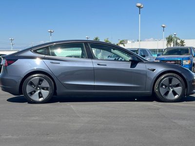 2022 Tesla Model 3 — rear three-quarter view