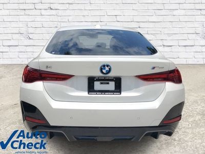 2025 BMW i4 — rear three-quarter view