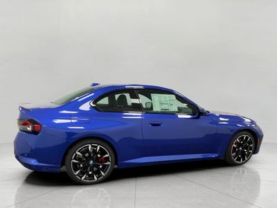 2026 BMW 230i — side profile view