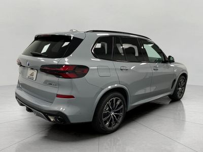 2026 BMW X5 — rear three-quarter view