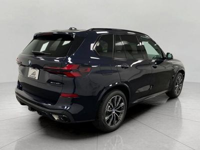 2026 BMW X5 — rear three-quarter view