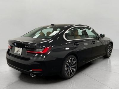 2026 BMW 330i — rear three-quarter view