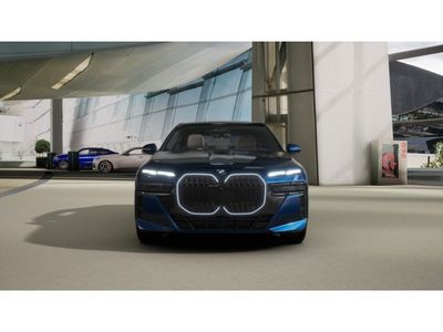 2026 BMW 740i — rear three-quarter view