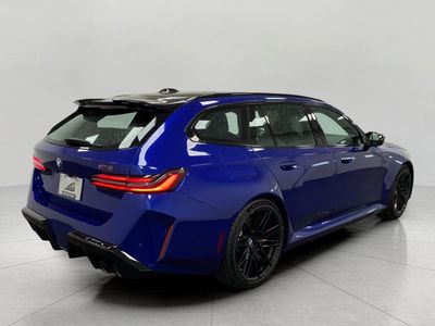 2027 BMW M5 — rear three-quarter view
