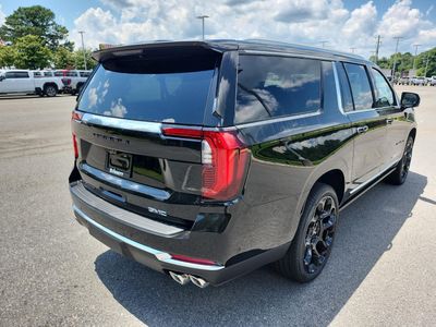 2026 GMC Yukon XL — rear three-quarter view