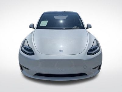 2023 Tesla Model Y — side profile view