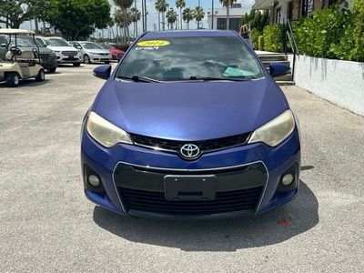 2014 Toyota Corolla — rear three-quarter view