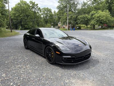 2022 Porsche Panamera — rear three-quarter view